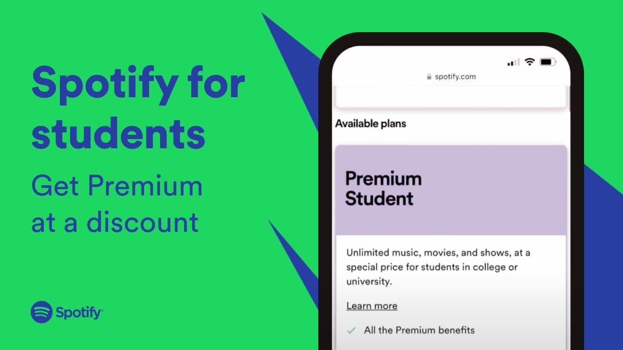 Student listening to Spotify Premium on headphones with a laptop